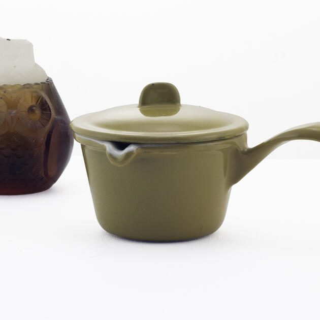 Portable cast iron ashtray in the form of a sauce pan with lid. Marked Descoware.