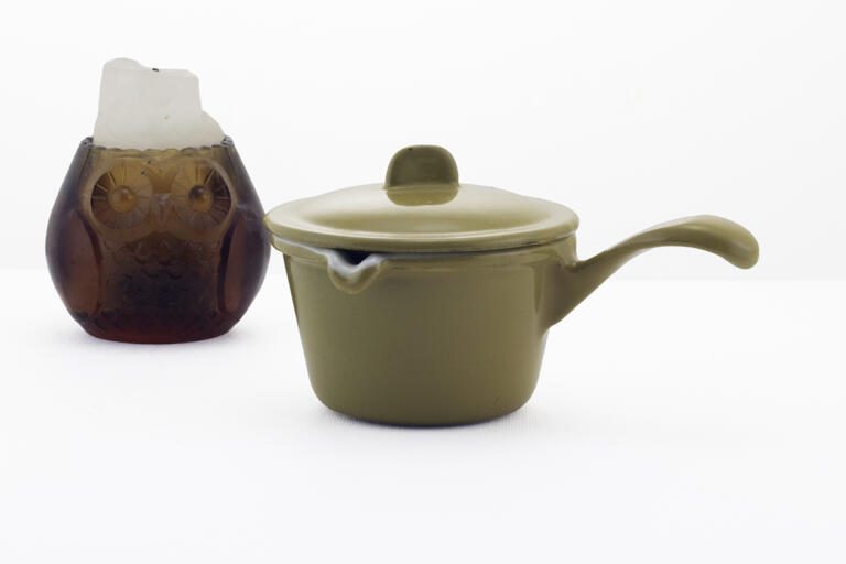 Portable cast iron ashtray in the form of a sauce pan with lid. Marked Descoware.