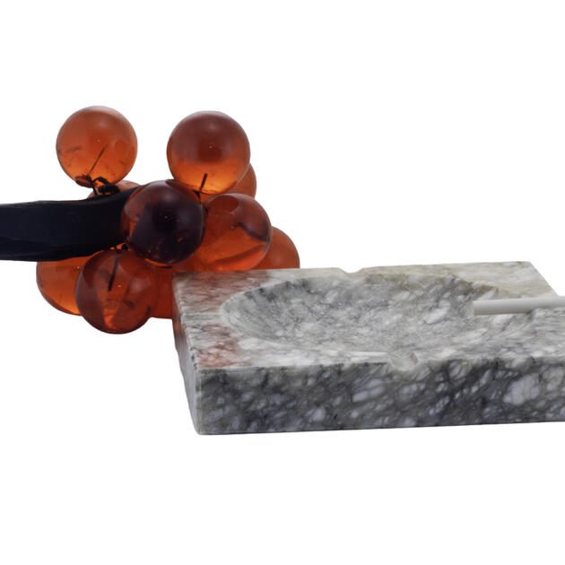 Large outdoor ashtray hand-carved in Alabaster stone. The original owner placed an I.D. label on the seat of the ashtray noting the date of 1965. It's large, heavy and perfect for outside.