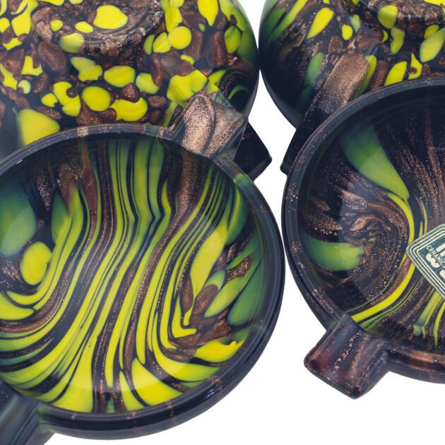 Set of four unused Venetian glass ashtrays with aventurine and monochrome décor in ebony black glass.